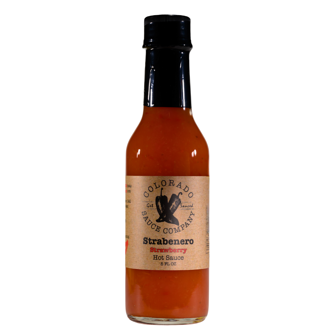 Bottle of Colorado Hot Sauce Company Stabenero Strawberry Habanero hot sauce with no background